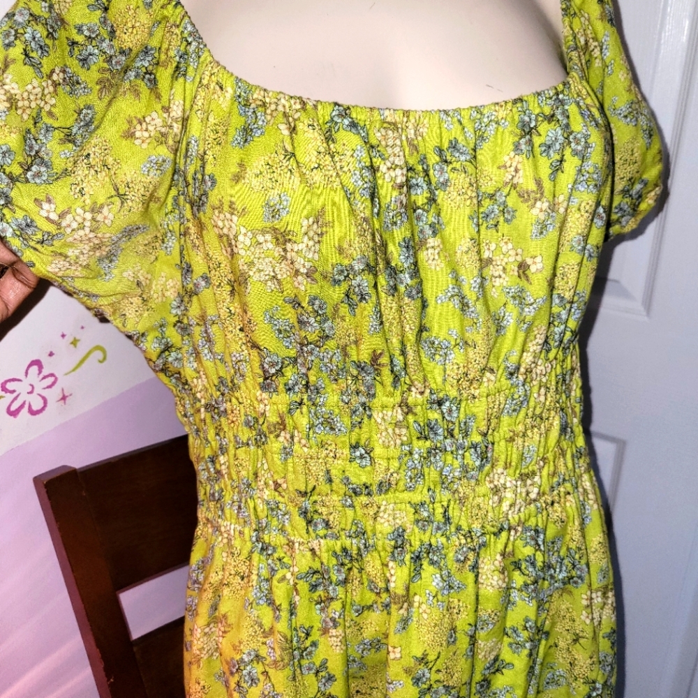 A lime green spring/summer knee length dress